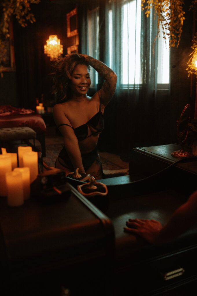 How to Prepare for a Boudoir Photoshoot: Woman relaxing into a boudoir session experience with Onyx and Sage Studios showing confidence and natural presence.