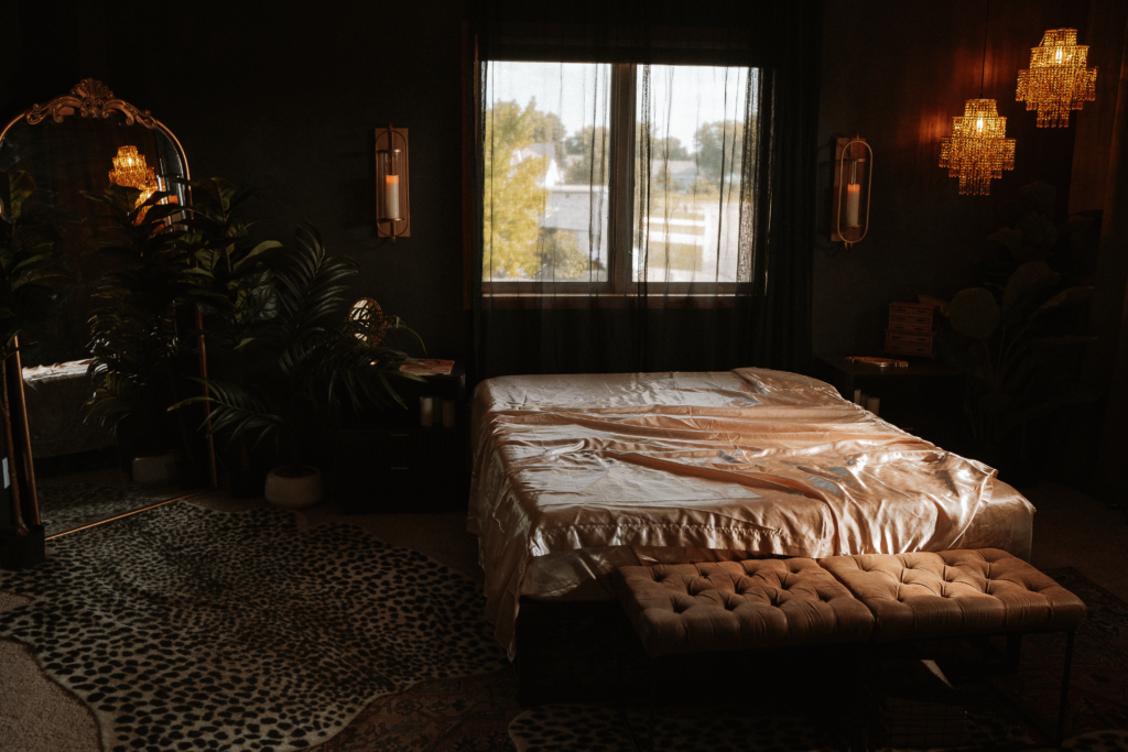 Luxury boudoir photography studio environment at Onyx and Sage Studios prepared for a client session with intentional lighting and styling