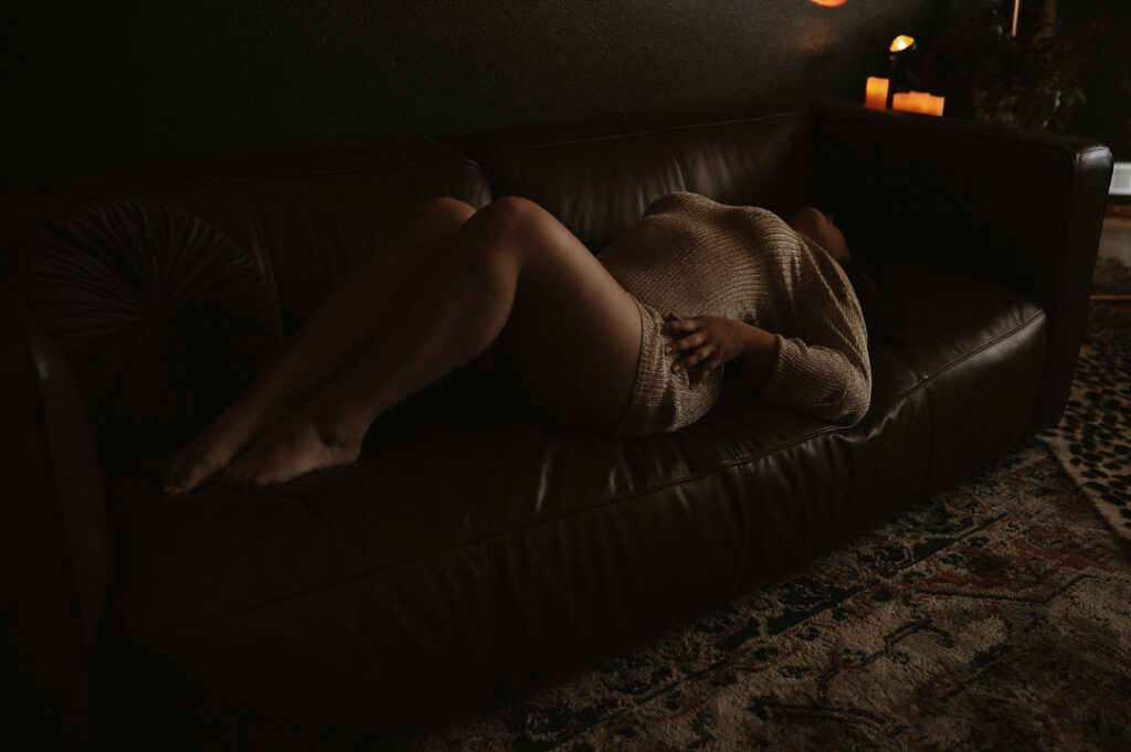 Client posing with relaxed confidence in The Onyx Haus